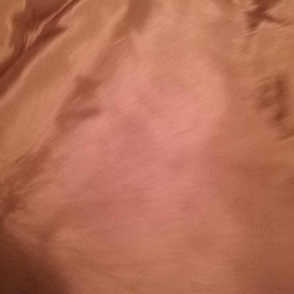 Brown-orange satin fabric